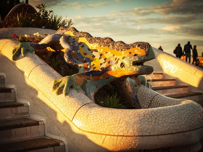 Park Guell trencadis mosaic dragon by Antoni Gaudi at the entrance staircase of the Monumental Zone in Barcelona